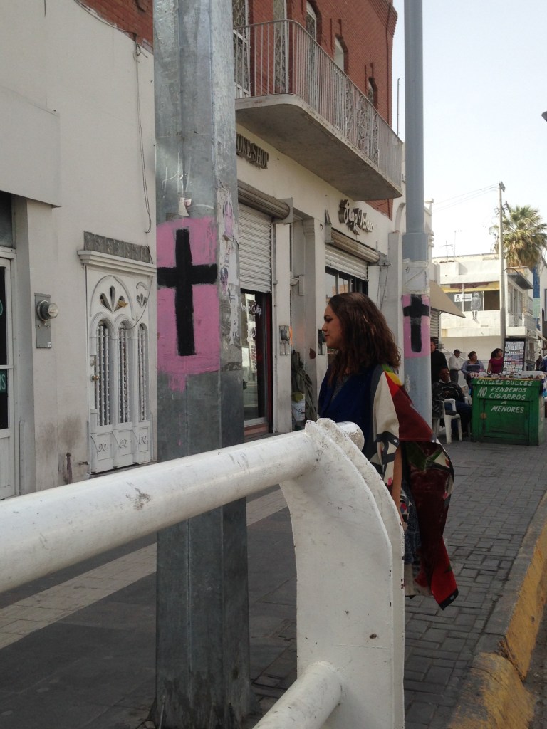 “Be an Active Witness” and “Huipil Fronterizo.” Performance and costume by Laila Espinoza,
downtown Ciudad Juárez, 2016.