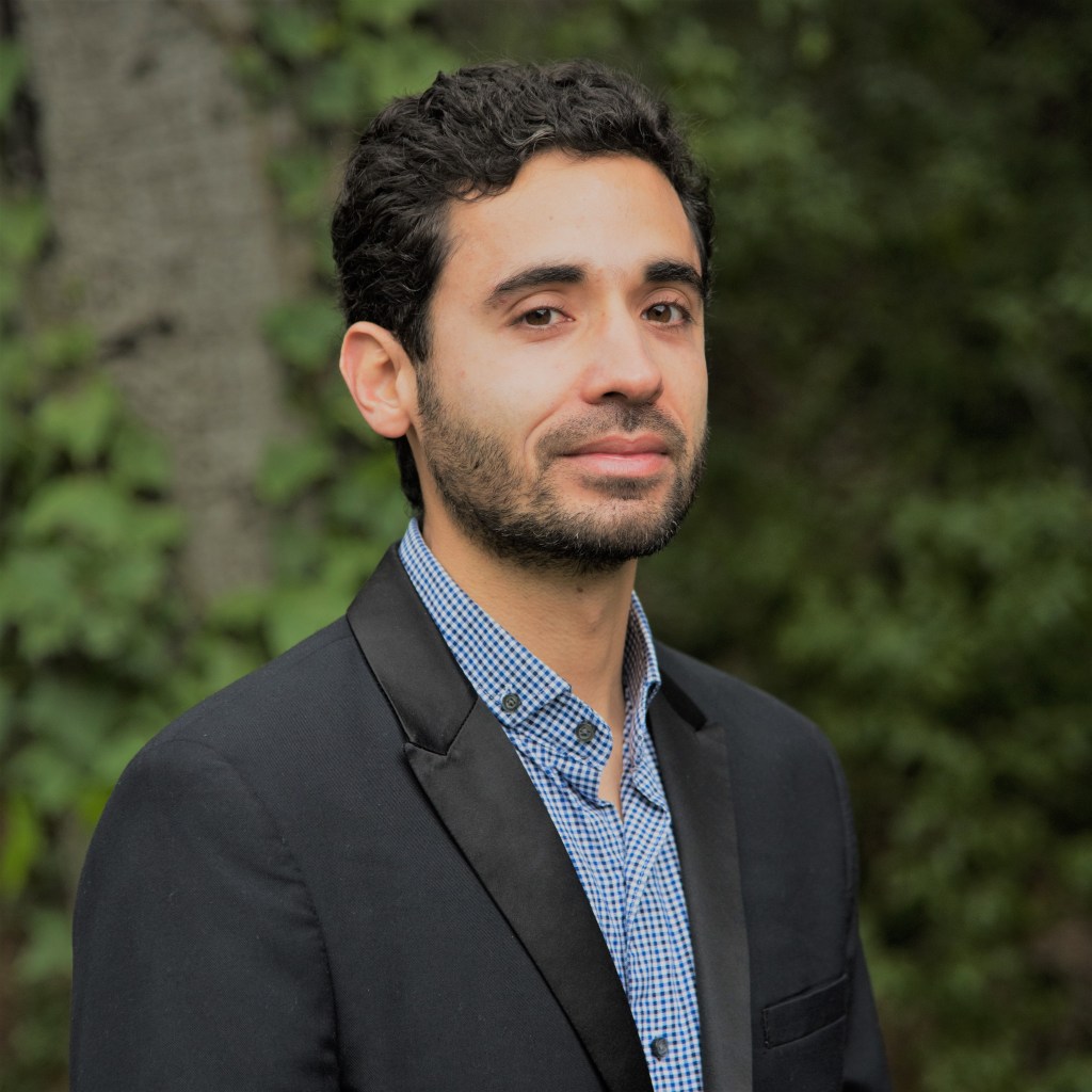 Portrait of Daniel Payares-Montoya, from Medellín, Colombia, a Consultant at the World Bank and Distinguished Research Fellow at Solutions Lab