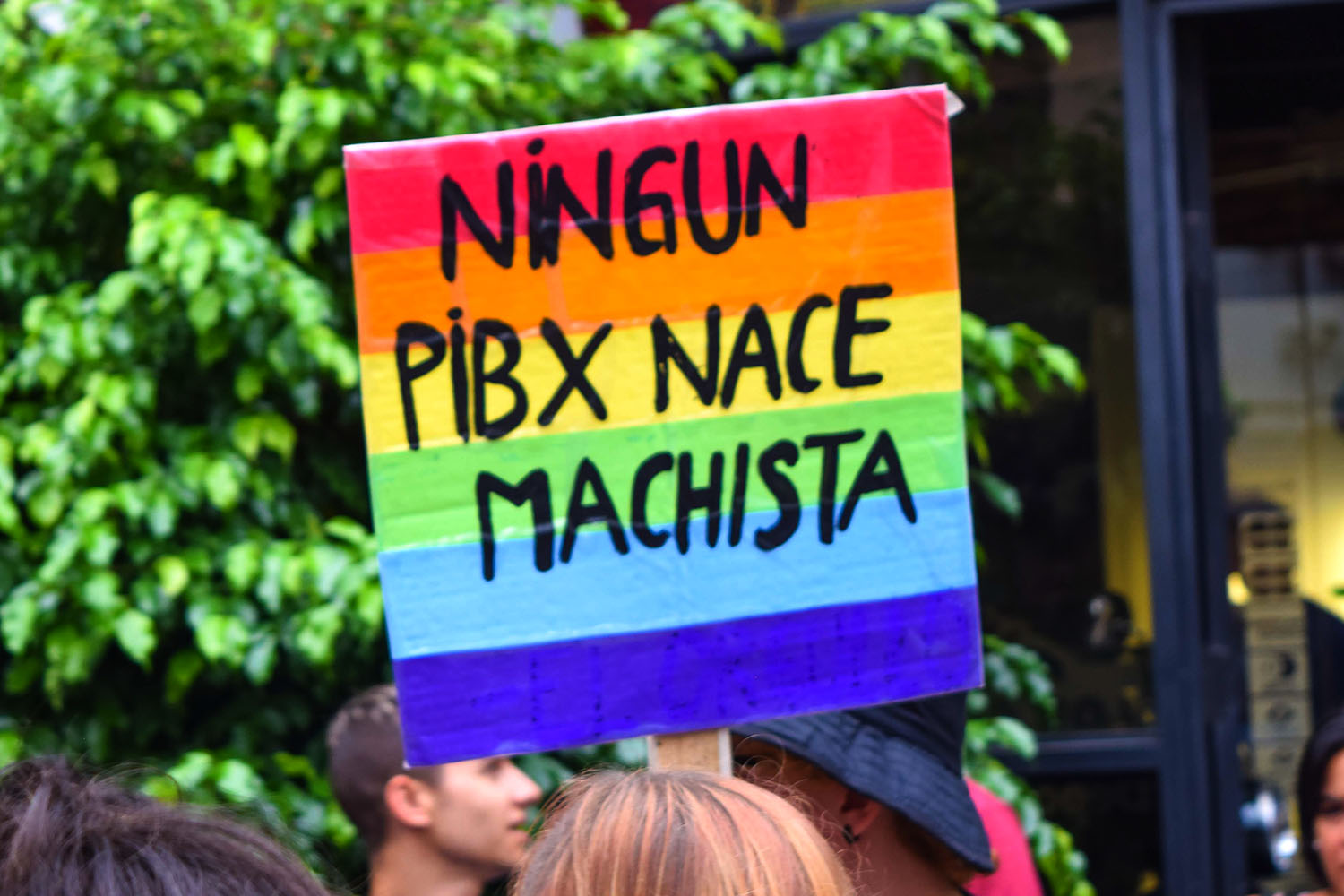 A sign reads No one is born macho at the Paro Internacional de Mujeres (International Women's Strike) in Santa Fe, Argentina, 2017. (Photo by Mariacarpio.)