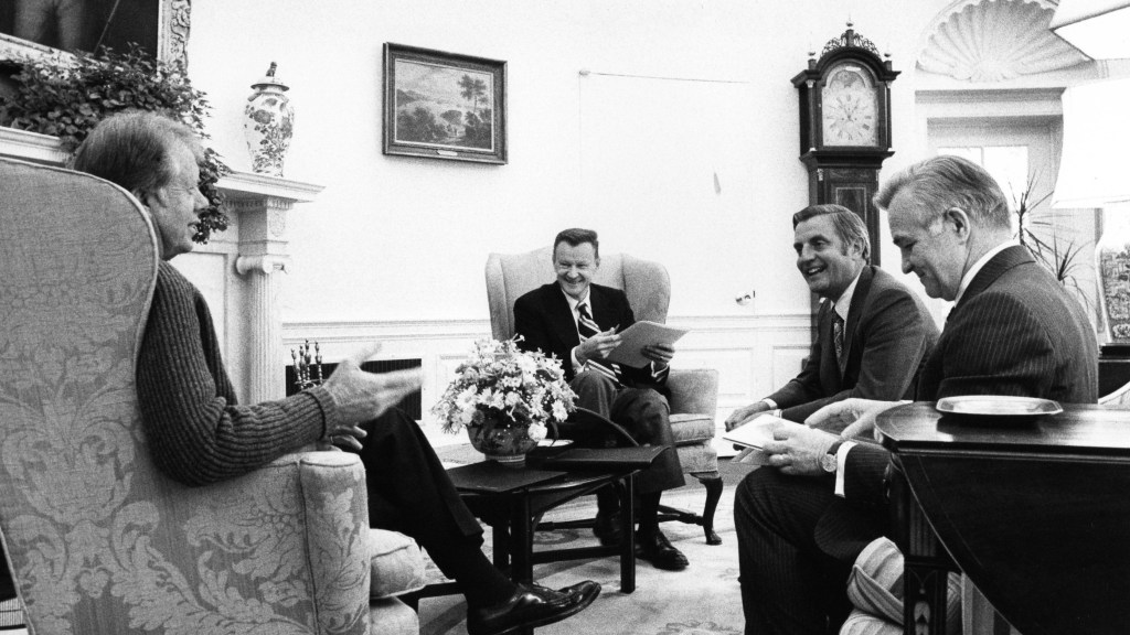 President Jimmy Carter in a 1977 Oval Office meeting with his national security team.