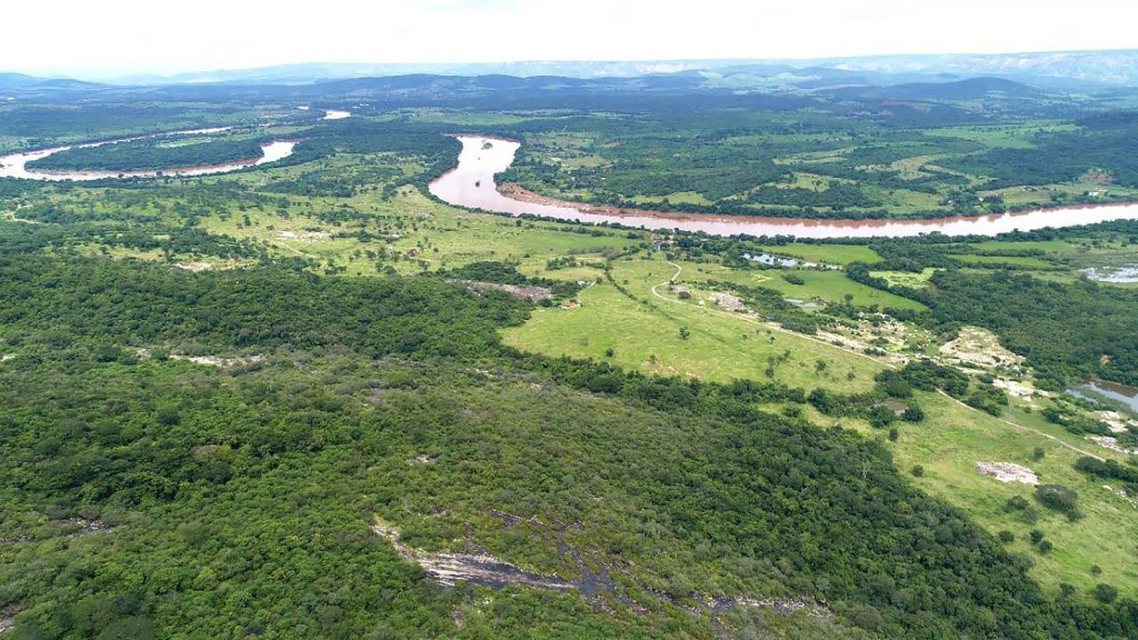 A river winds through green and forested countryside in this photo from Brazil.