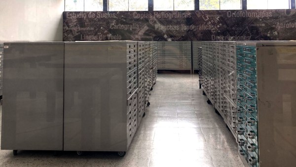 A window-lit room with large numbers of filing cabinets in Colombia.