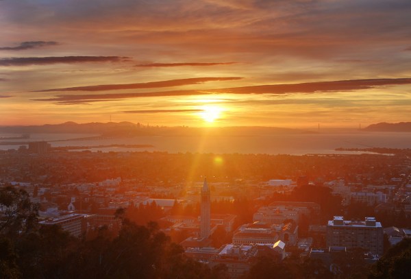 Sunset over San Francisco Bay, with the UC Berkeley campus in the foreground.
